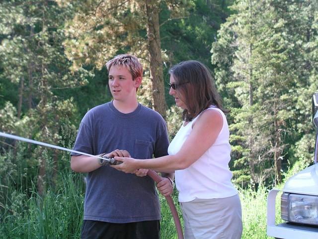 Sally and Anthony spraying water from the fire truck.