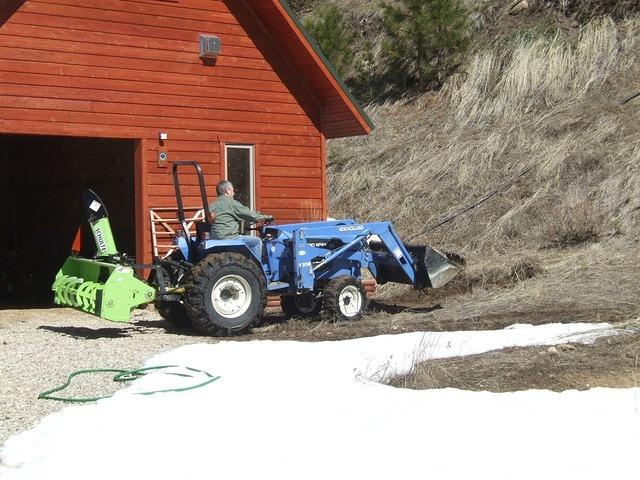 Preparing the area by the barn for the new planter bed.