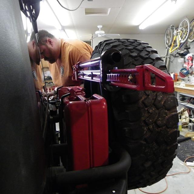 Christian is putting the tail light back on.