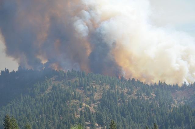 The fire has grown time is around 2 PM Sept 18