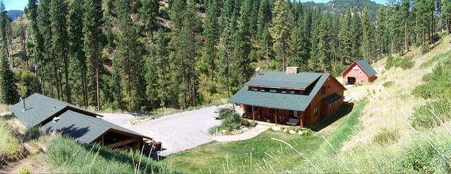 Panoramic of home on 8/29/09 taken from the road behind the garage which goes to the top of our hill.
