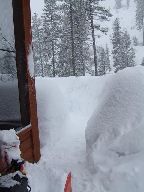 Oh what a difference two and a half feet of snow makes! On Feb 3, 2008 the pathway to the back deck is too snow filled to use th