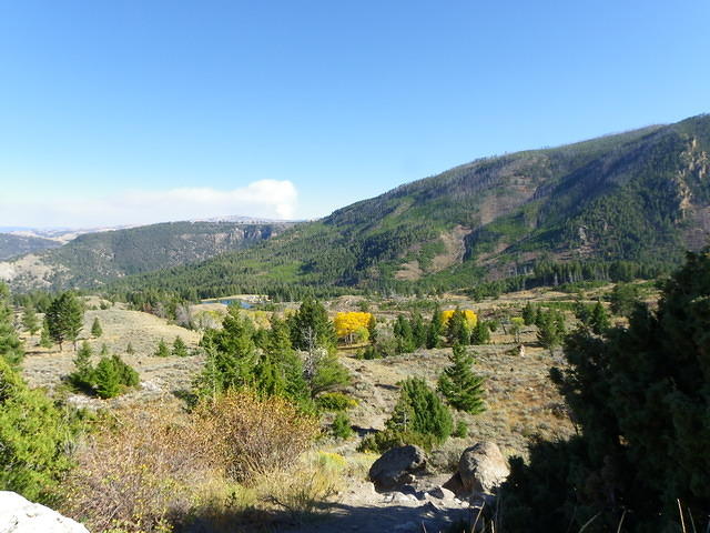 Yellowstone is not all geysers. Some beautiful scenery. A forest fire in the distance formed the only cloud we saw during our vi