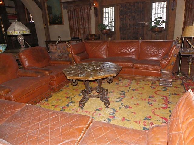 The living room is quite ornate. It was built in a Spanish style.