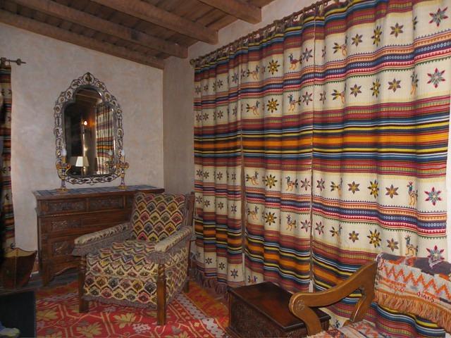 Thr furnishings here are too ornate for my tastes, but Curtis covets the drapes.