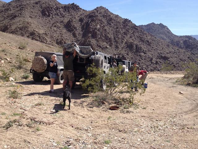 Vicki and Rick put away temporary shade after lunch.