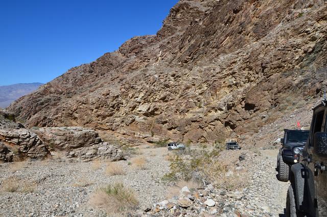 The jeeps keep a fair distance apart.