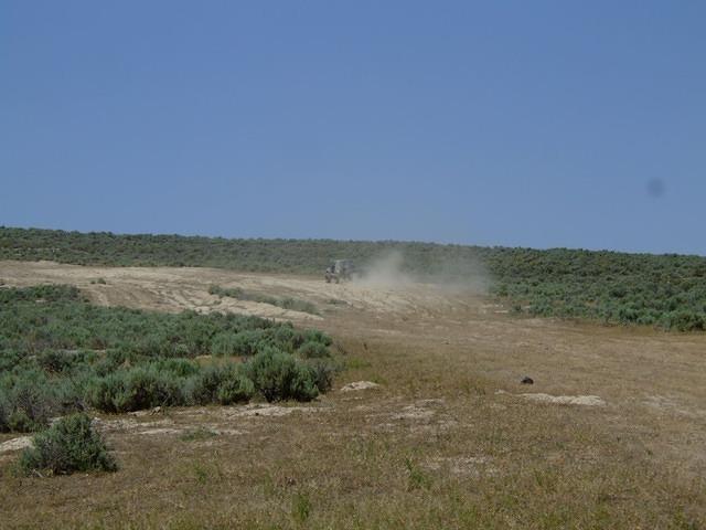 Don's Suzuki has been modofied and does really well going up a steep sandy rutted hill.