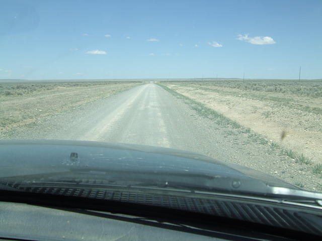 The road detriorated to a one lane road, but there was no traffic. The road was still in good shape.