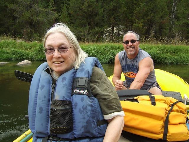 While going through smooth water, Drew takes his life vest off.