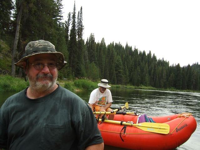 Through the rapids, Curtis got wet! Steve has his jacket off already.
