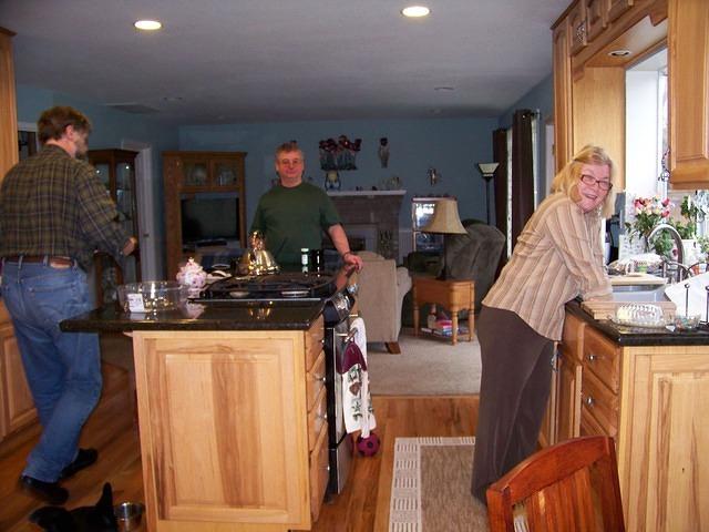 Kent, Curtis and Patty in the kitchen. The guys have a lot to talk about.