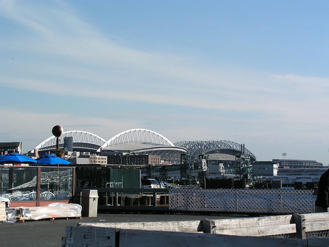 Since the football team wouldn't share with the baseball team, two stadium had to be built.