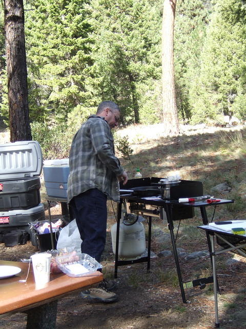 Curtis likes the new stove. It makes cooking meals really a snap!