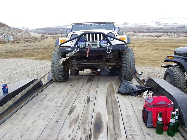 Precautions to keep the vehicle from rolling back. Christian can work safely.