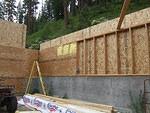 OSB is almost all up; when construction resumes, the stairway can go up.
