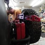 Christian is putting the tail light back on.