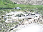 Looking down at the campground from a high hill. It is next to a federal wet lands area.
