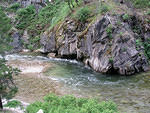 Big rocks line the shore of the middle fork of the Boise River.