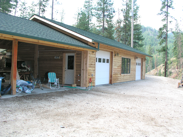 Garage has siding now