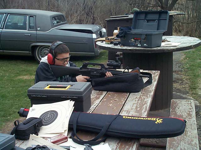 Anthony Shooting Curtis's AR-15